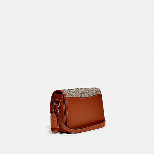 Coach
Sac besace Tabby Signature en toile monogrammée