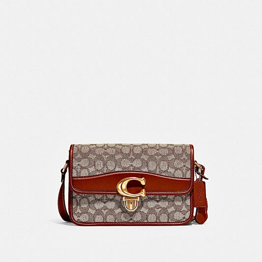 Coach
Sac besace Tabby Signature en toile monogrammée