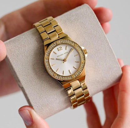 Petite montre Lennox dorée à pierres pavées MK7278