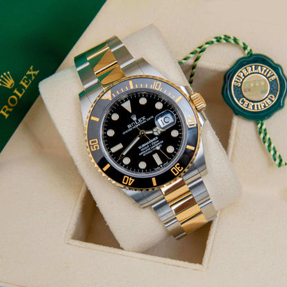 ROLEX SUBMARINER BLACK AND GOLD