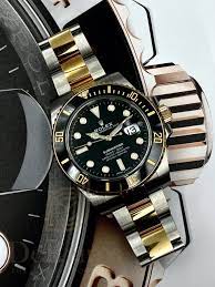 ROLEX SUBMARINER BLACK AND GOLD